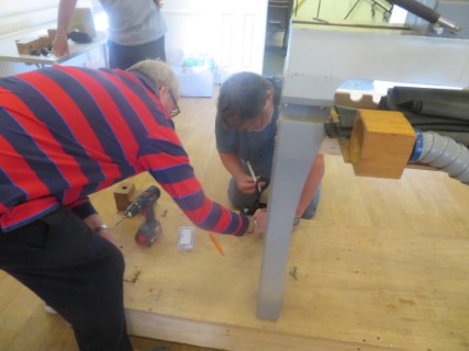 Steve and Dave preparing the lathe to have it's wheels fitted